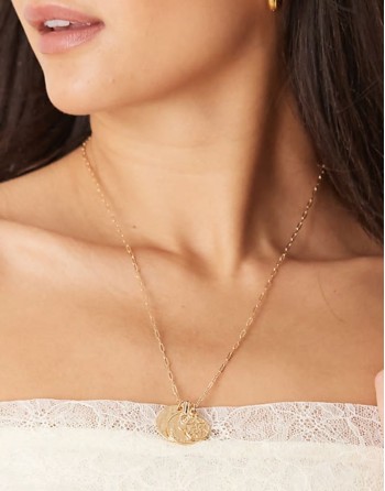 necklace with coin pendants in gold tone